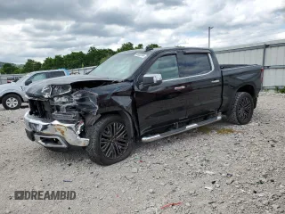 2019 Chevrolet Silverado 1500 LTZ with VIN 1GCUYGEL7KZ124884, listed as a Copart auction lot 58082934 with 124,904 mi miles and Salvage Title. Bid and sale history available at DreamBid. Image 1.