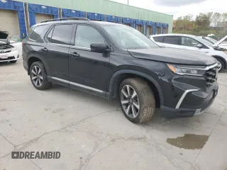 2023 Honda Pilot Elite with VIN 5FNYG1H84PB042259, listed as a Copart auction lot 75609714 with 71,025 mi miles and Salvage Title. Bid and sale history available at carsss.com. Image 4.