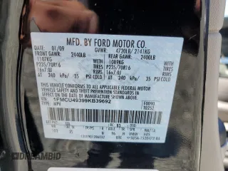 2009 Ford Escape Hybrid with VIN 1FMCU49399KB39692, listed as a Copart auction lot 64418925 with 147,204 mi miles and Salvage title. Bid and sale history available at DreamBid. Image 13.