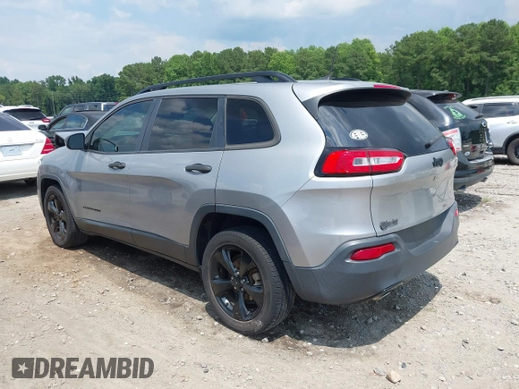 2016 Jeep Cherokee Altitude with VIN 1C4PJLAB7GW307900, listed as a IAAI auction lot 42611390 with 130,123 mi miles and . Bid and sale history available at DreamBid. Image 3.