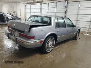 1991 Cadillac Seville z VIN 1G6KS53B2MU809384, wystawiony jako Copart lot #77185134 z przebiegiem 134 769 mil mil oraz Szkody całkowita. Historia ofert i sprzedaży dostępna na DreamBid. Obrazek 3.