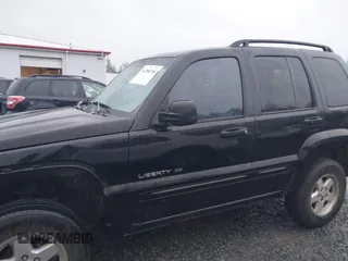 2002 Jeep Liberty Limited with VIN 1J8GL58KX2W198975, listed as a IAAI auction lot 41200746 with 220,079 mi miles and . Bid and sale history available at DreamBid. Image 14.