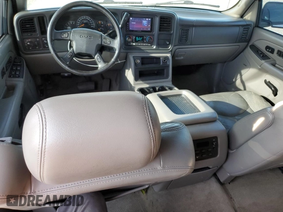 2005 GMC Yukon SLT z VIN 1GKEC13T75R205508, wystawiony jako Copart lot #87511845 z przebiegiem 179 749 mil mil oraz Szkoda całkowita • Salvage title. Historia ofert i sprzedaży dostępna na DreamBid. Obrazek 8.