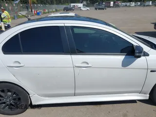 2017 Mitsubishi Lancer ES with VIN JA32U2FU5HU015258, listed as a IAAI auction lot 42121579 with 175,762 mi miles. Bid and sale history available at carsss.com. Image 13.