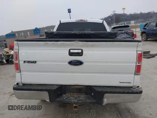 2012 Ford F-150 XL with VIN 1FTFX1EF2CFC77744, listed as a IAAI auction lot 41565431 with 200,701 mi miles. Bid and sale history available at carsss.com. Image 16.