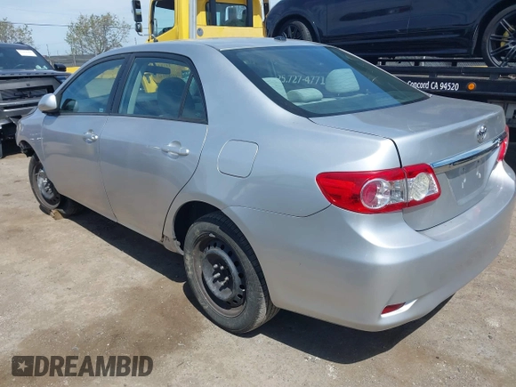2011 Toyota Corolla L with VIN 2T1BU4EE1BC572731, listed as a IAAI auction lot 42024851 with 153,923 mi miles. Bid and sale history available at carsss.com. Image 3.