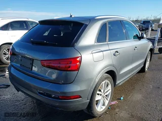 2016 Audi Q3 Premium Plus with VIN WA1BFCFSXGR014778, listed as a IAAI auction lot 41285863 with 73,044 mi miles. Bid and sale history available at carsss.com. Image 4.