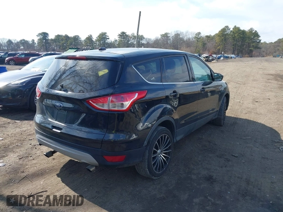 2014 Ford Escape SE with VIN 1FMCU9GXXEUA57133, listed as a IAAI auction lot 41642184 with 1 mi miles. Bid and sale history available at carsss.com. Image 4.