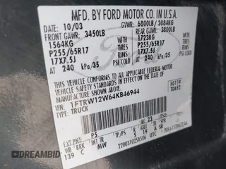 2004 Ford F-150 XLT with VIN 1FTRW12W64KB46944, listed as a IAAI auction lot 41208511 with 293,981 mi miles. Bid and sale history available at carsss.com. Image 9.