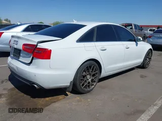 2014 Audi A6 Premium Plus with VIN WAUGFAFC6EN054589, listed as a IAAI auction lot 42308820 with 134,566 mi miles and . Bid and sale history available at DreamBid. Image 4.