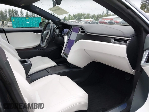 2017 Tesla Model S 100D with VIN 5YJSA1E26HF224568, listed as a IAAI auction lot 42140201 with 102,403 mi miles. Bid and sale history available at carsss.com. Image 5.