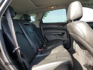 2015 Cadillac SRX Performance Collection with VIN 3GYFNCE32FS558430, listed as a Copart auction lot 63633865 with 153,729 mi miles and Salvage title. Bid and sale history available at DreamBid. Image 11.
