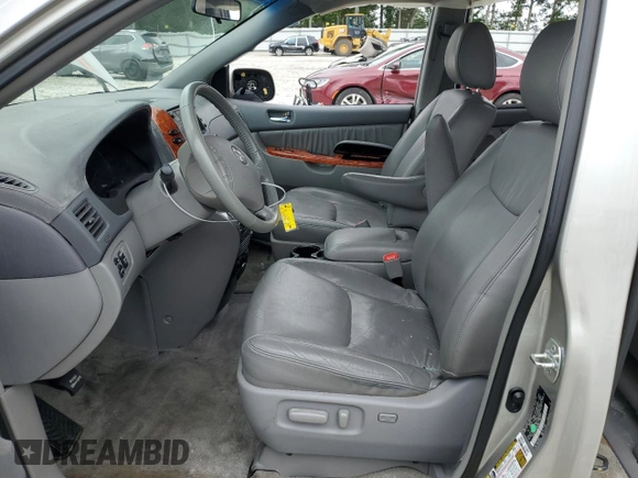 2010 Toyota Sienna XLE with VIN 5TDYK4CC1AS322395, listed as a Copart auction lot 60520215 with 148,725 mi miles and Salvage title. Bid and sale history available at DreamBid. Image 7.