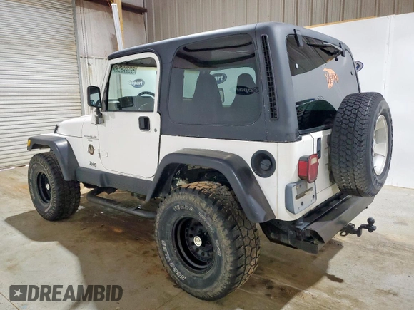 2001 Jeep Wrangler Sahara with VIN 1J4FA59S41P303519, listed as a Copart auction lot 59899545 with 238,151 mi miles and Clean title. Bid and sale history available at DreamBid. Image 2.