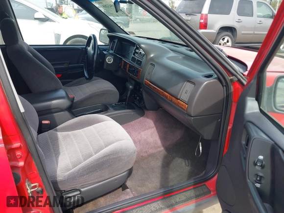 1996 Jeep Grand Cherokee Laredo with VIN 1J4FX58S4TC346218, listed as a IAAI auction lot 41943268 with 138,431 mi miles and . Bid and sale history available at DreamBid. Image 5.