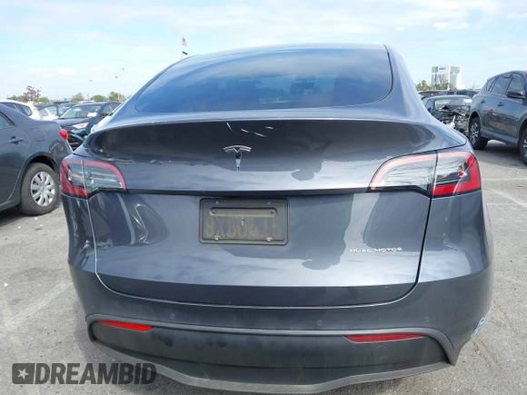 2021 Tesla Model Y Long Range with VIN 5YJYGDEE6MF209034, listed as a IAAI auction lot 41896238 with 53,401 mi miles. Bid and sale history available at carsss.com. Image 17.