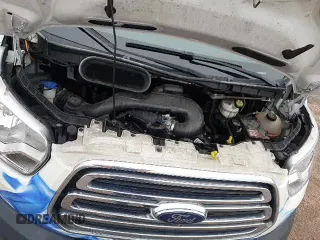 2017 Ford Transit z VIN 1FTYR1ZM5HKB23460, wystawiony jako Copart lot #58284925 z przebiegiem 106 501 mil mil oraz Szkoda całkowita • Salvage title. Historia ofert i sprzedaży dostępna na DreamBid. Obrazek 14.