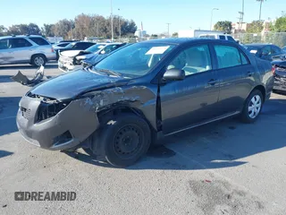 2009 Toyota Corolla with VIN 1NXBU40E09Z147694, listed as a IAAI auction lot 41741275 with 170,912 mi miles. Bid and sale history available at carsss.com. Image 2.