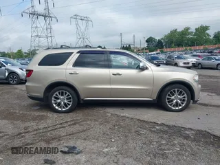 2015 Dodge Durango Citadel with VIN 1C4SDHET1FC702219, listed as a IAAI auction lot 42705080 with 159,995 mi miles and . Bid and sale history available at DreamBid. Image 14.