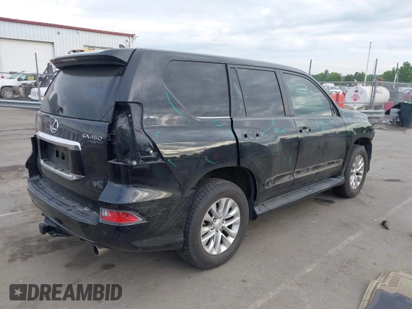 2014 Lexus GX with VIN JTJBM7FX0E5069997, listed as a IAAI auction lot 42076860 with 122,800 mi miles. Bid and sale history available at carsss.com. Image 4.