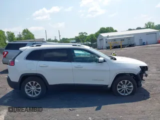 2019 Jeep Cherokee Latitude z VIN 1C4PJMCX9KD189948, wystawiony jako IAAI lot #42487738 z przebiegiem 72 573 mil mil oraz . Historia ofert i sprzedaży dostępna na DreamBid. Obrazek 13.