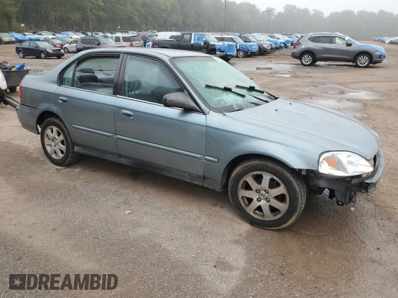 2000 Honda Civic VP with VIN 2HGEJ6612YH566224, listed as a Copart auction lot 74302284 with 197,203 mi miles and Salvage Title. Bid and sale history available at carsss.com. Image 4.