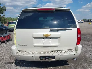 2013 Chevrolet Tahoe LTZ with VIN 1GNSKCE07DR326996, listed as a IAAI auction lot 42203073 with 147,067 mi miles and . Bid and sale history available at DreamBid. Image 16.