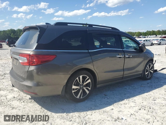 2019 Honda Odyssey Elite z VIN 5FNRL6H97KB078414, wystawiony jako Copart lot #57327895 z przebiegiem 119 259 mil mil oraz Szkoda całkowita • Salvage title. Historia ofert i sprzedaży dostępna na DreamBid. Obrazek 3.
