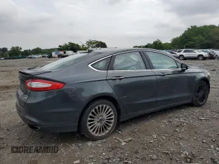 2016 Ford Fusion Titanium with VIN 3FA6P0K95GR158075, listed as a Copart auction lot 64476715 with 137,656 mi miles and Salvage title. Bid and sale history available at DreamBid. Image 3.