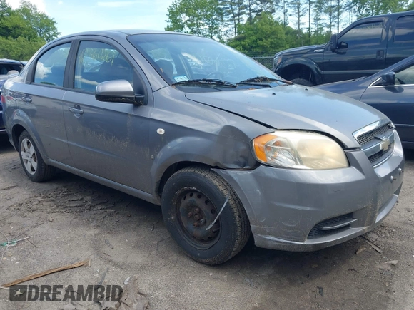 2007 Chevrolet Aveo LS z VIN KL1TD56687B061158, wystawiony jako IAAI lot #42360261 z przebiegiem 74 079 mil mil oraz . Historia ofert i sprzedaży dostępna na DreamBid. Obrazek 1.
