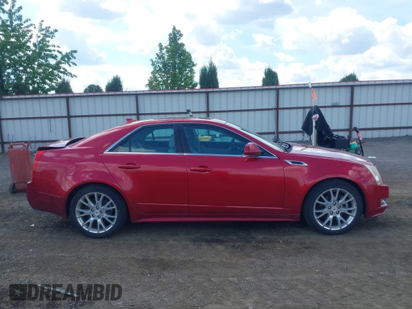 2012 Cadillac CTS Premium z VIN 1G6DS5E31C0104841, wystawiony jako IAAI lot #42292295 z przebiegiem 124 477 mil mil oraz . Historia ofert i sprzedaży dostępna na DreamBid. Obrazek 13.