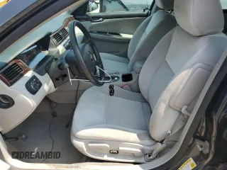 2014 Chevrolet Impala LT with VIN 2G1WB5E36E1135587, listed as a Copart auction lot 64557805 with 95,105 mi miles and Salvage title. Bid and sale history available at DreamBid. Image 7.