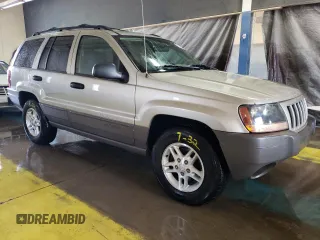 2004 Jeep Grand Cherokee Laredo z VIN 1J4GW48S24C327184, wystawiony jako Copart lot #53702515 z przebiegiem 151 411 mil mil oraz Czysty tytuł • Clean title. Historia ofert i sprzedaży dostępna na DreamBid. Obrazek 4.