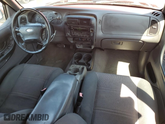 2002 Ford Ranger XLT Appearance with VIN 1FTYR44E32PA07430, listed as a Copart auction lot 54067335 with 209,433 mi miles and Salvage title. Bid and sale history available at DreamBid. Image 8.