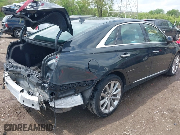 2014 Cadillac XTS Luxury with VIN 2G61M5S31E9308419, listed as a IAAI auction lot 42128868 with 111,492 mi miles and . Bid and sale history available at DreamBid. Image 4.