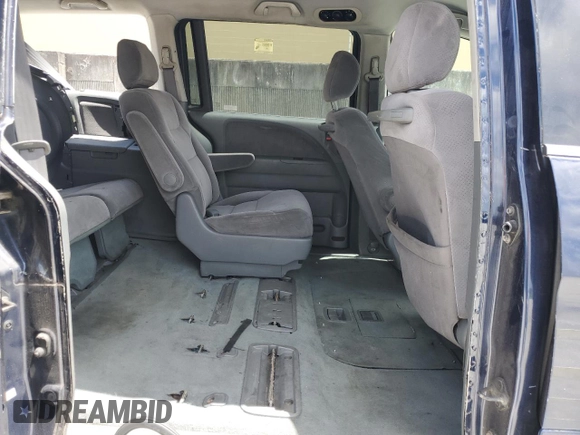 2007 Honda Odyssey LX z VIN 5FNRL382X7B082143, wystawiony jako Copart lot #61271825 z przebiegiem 236 594 mil mil oraz Szkoda całkowita • Salvage title. Historia ofert i sprzedaży dostępna na DreamBid. Obrazek 11.