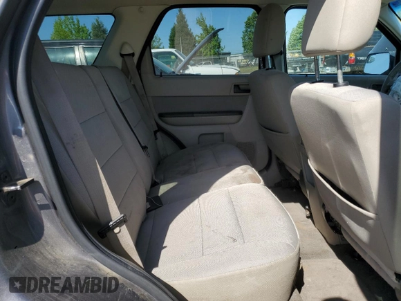2011 Ford Escape XLT z VIN 1FMCU9DG7BKC39271, wystawiony jako Copart lot #55880445 z przebiegiem 202 072 mil mil oraz Szkoda całkowita • Salvage title. Historia ofert i sprzedaży dostępna na DreamBid. Obrazek 11.