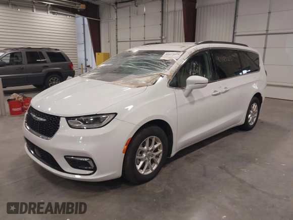 2022 Chrysler Pacifica Touring L with VIN 2C4RC1BGXNR144831, listed as a IAAI auction lot 40473026 with 36,495 mi miles and . Bid and sale history available at DreamBid. Image 2.