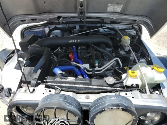 2005 Jeep Wrangler Sport z VIN 1J4FA49S75P324462, wystawiony jako Copart lot #59818995 z przebiegiem 183 558 mil mil oraz Nie do naprawy • Non repairable. Historia ofert i sprzedaży dostępna na DreamBid. Obrazek 11.