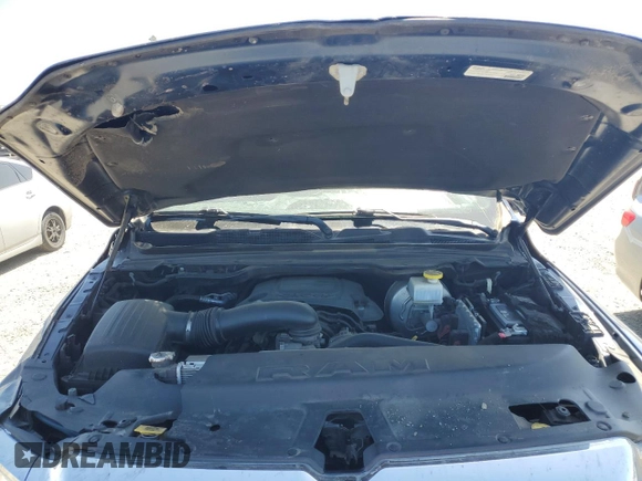 2021 Ram 1500 Big Horn z VIN 1C6SRFMTXMN562364, wystawiony jako Copart lot #55867085 z przebiegiem 77 000 mil mil oraz Szkoda całkowita • Salvage title. Historia ofert i sprzedaży dostępna na DreamBid. Obrazek 11.