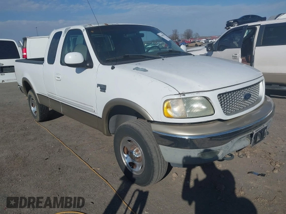 1999 Ford F-150 XL with VIN 1FTRX18L3XKB33860, listed as a IAAI auction lot 41664761 with 305,767 mi miles. Bid and sale history available at carsss.com. Image 1.