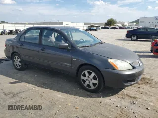 2004 Mitsubishi Lancer LS with VIN JA3AJ36E64U046788, listed as a Copart auction lot 71395384 with 222,288 mi miles and Salvage Title. Bid and sale history available at carsss.com. Image 4.