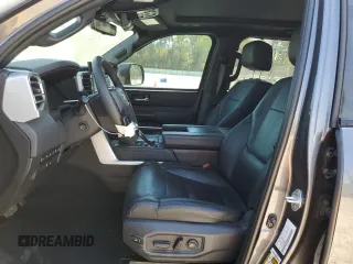 2023 Toyota Tundra Platinum with VIN 5TFNA5DBXPX073809, listed as a Copart auction lot 51221005 with 60,726 mi miles and Salvage title. Bid and sale history available at DreamBid. Image 7.
