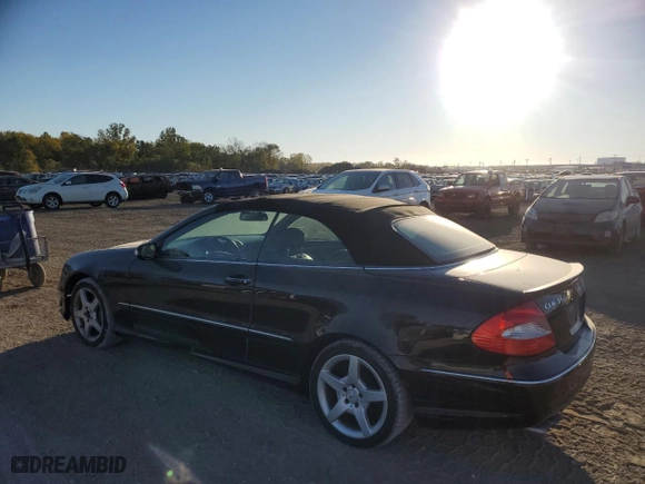 2009 Mercedes-Benz CLK-Class 3.5L with VIN WDBTK56F09F263615, listed as a Copart auction lot 75877104 with 162,245 mi miles and Salvage Title. Bid and sale history available at carsss.com. Image 2.
