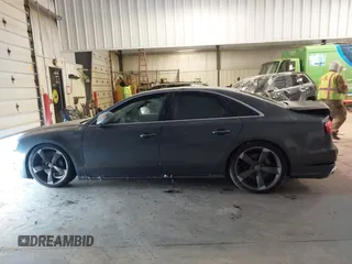 2015 Audi S8 with VIN WAUK2AFD0FN005369, listed as a IAAI auction lot 41312743 with 76,750 mi miles. Bid and sale history available at carsss.com. Image 14.