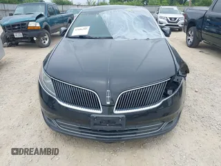 2013 Lincoln MKS EcoBoost with VIN 1LNHL9FT3DG607213, listed as a IAAI auction lot 42686285 with 97,622 mi miles and . Bid and sale history available at DreamBid. Image 6.