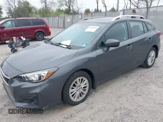 2018 Subaru Impreza Premium z VIN 4S3GTAD61J3703780, wystawiony jako IAAI lot #42081604 z przebiegiem 79 757 mil mil oraz . Historia ofert i sprzedaży dostępna na DreamBid. Obrazek 2.