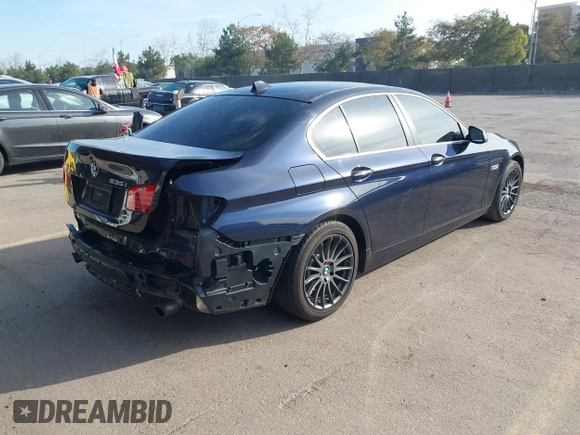 2014 BMW 5 Series 535i with VIN WBA5B1C56ED481995, listed as a IAAI auction lot 41583675 with 95,511 mi miles. Bid and sale history available at carsss.com. Image 4.