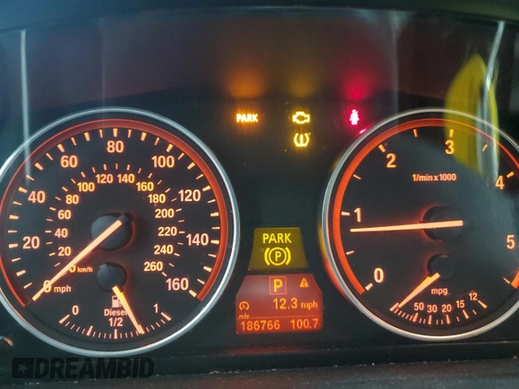 2010 BMW X5 35d with VIN 5UXFF0C54ALT77574, listed as a Copart auction lot 52108425 with 186,766 mi miles and Salvage Title. Bid and sale history available at carsss.com. Image 9.