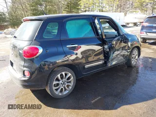 2014 FIAT 500L Lounge with VIN ZFBCFACH5EZ006918, listed as a IAAI auction lot 41773284 with 94,600 mi miles and . Bid and sale history available at DreamBid. Image 4.